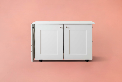 White storage cabinet with wheels on a pink background [Standard] [Deluxe]