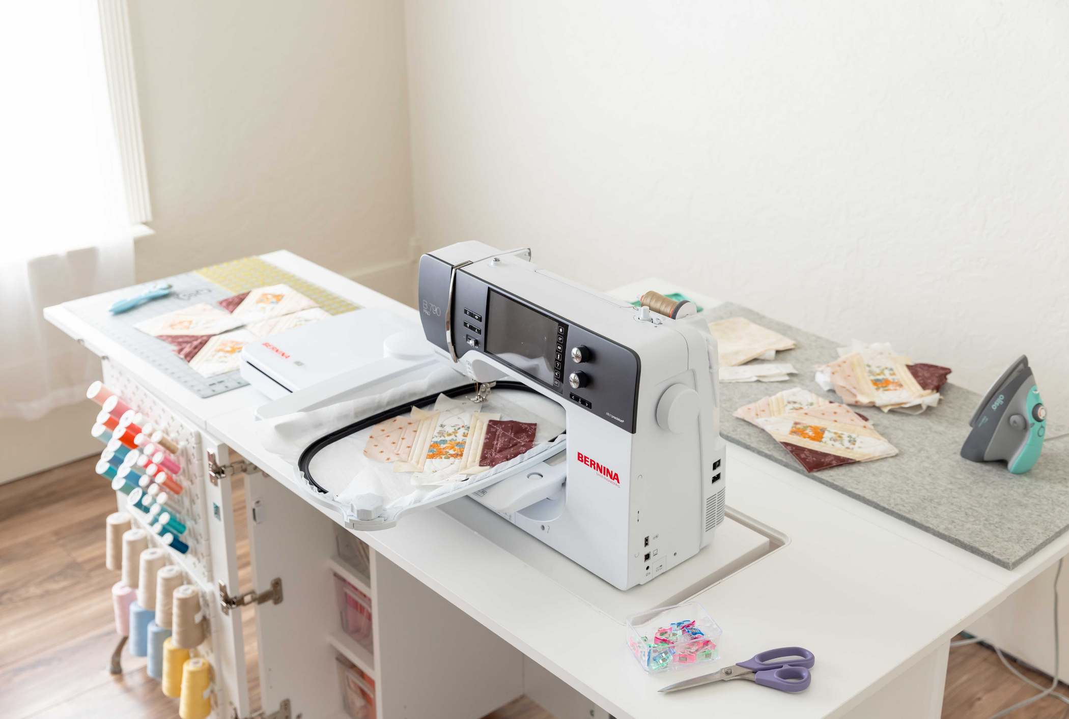 Overhead shot of sewing, ironing, and cutting materials [Deluxe] [Standard]